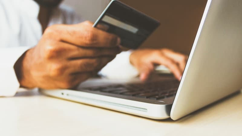 Floating generic bank cards on dark background